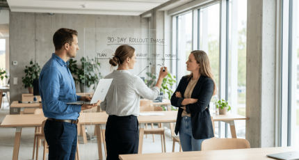 IT team planning a SASE implementation timeline at a whiteboard in a modern European office.